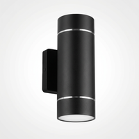 Wash GEC RGBW wall sconce featuring  black cylindrical light fixture, remote control, and features for colorful indoor and outdoor car wash lighting in a side view